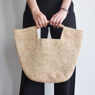 A crocheted raffia handbag